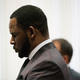 R&B singer R. Kelly appears at a hearing before Judge Lawrence Flood June 26, 2019, in Chicago.
